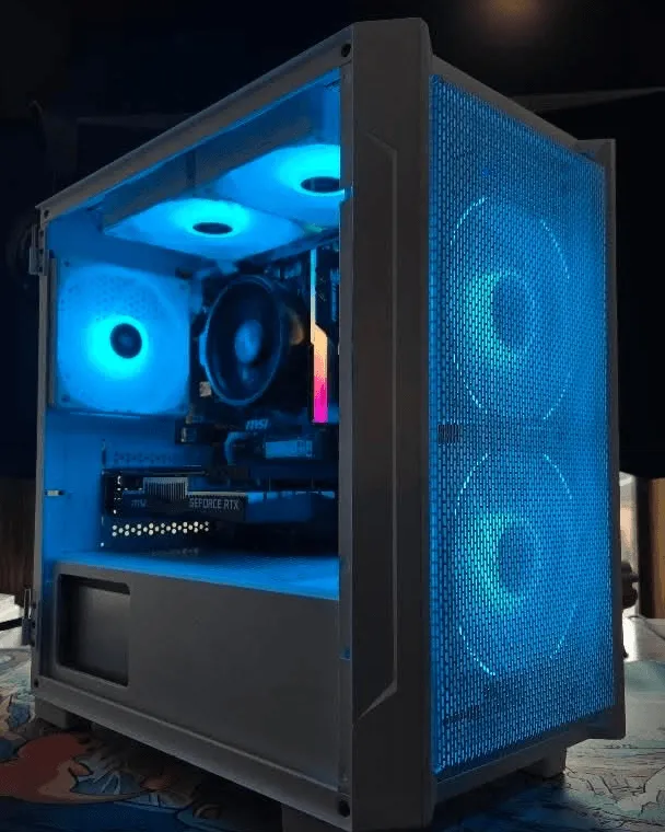 White micro-ATX tower glowing blue through a full mesh front