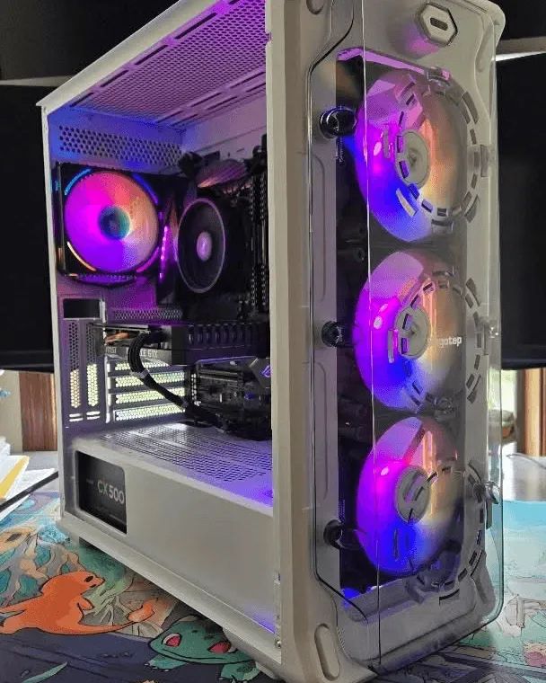 White dual-chamber showcase build with rainbow RGB fans and white cables
